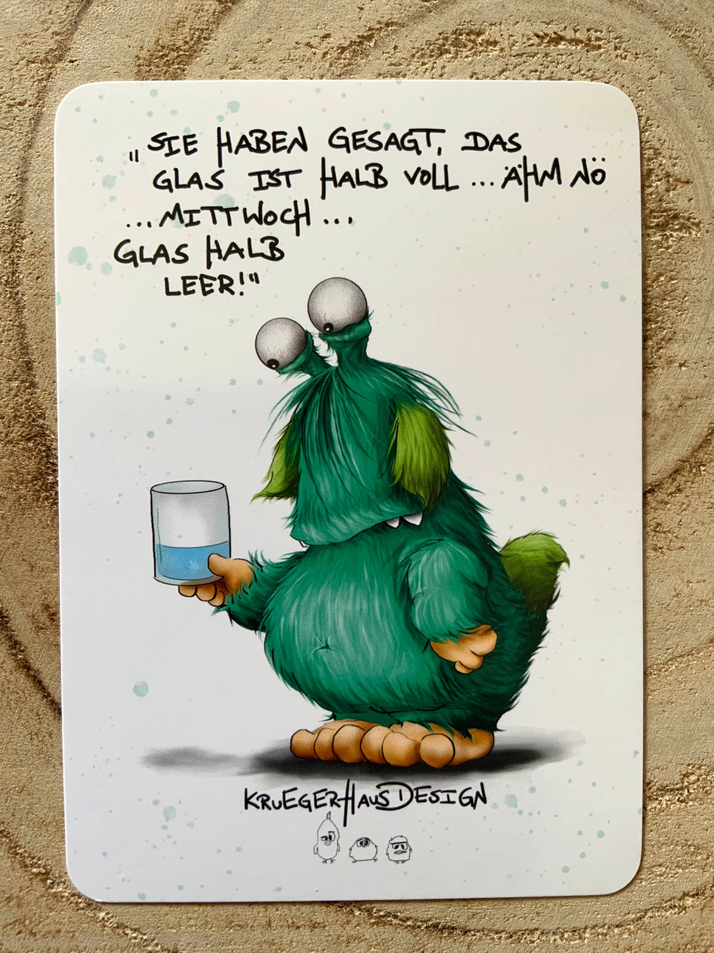 Postkarte Monster Kruegerhausdesign  " Sie haben gesagt, das Glas ist halb voll..."